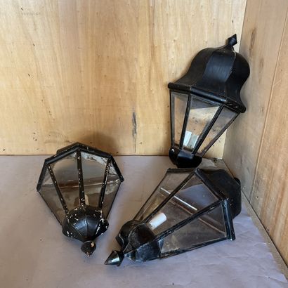 Luminaries: suite of three sconces in black...