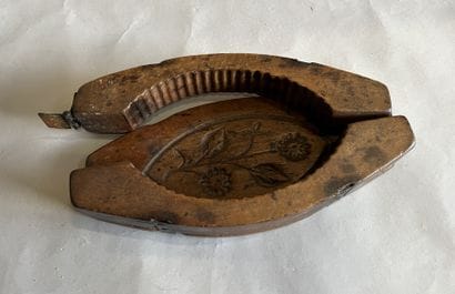 Wooden butter mold with hinge, the bottom...