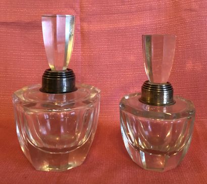 Two crystal bottles of octagonal form, the...