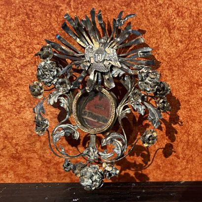 Reliquary with paperolles in a silver plated...