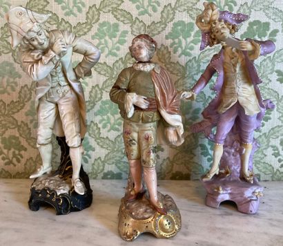 Three statuettes in porcelain and polychrome...