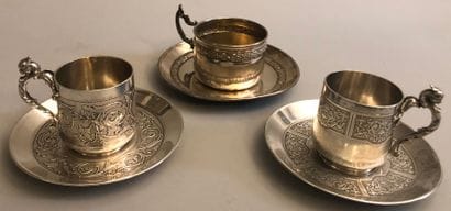 Three silver cups and their saucer (925)...