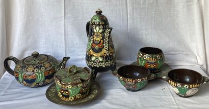 Small set of serving pieces in enamelled...
