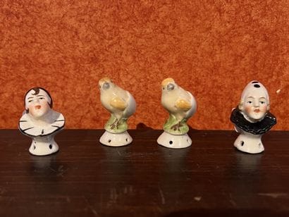 Suite of four polychrome porcelain powder...