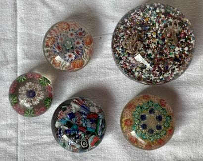 Five paperweights with millefiori decoration....