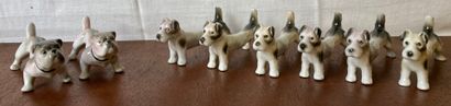 Eight porcelain knife holders, six featuring...