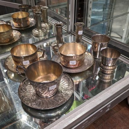 Set in silver plated metal, including: a...