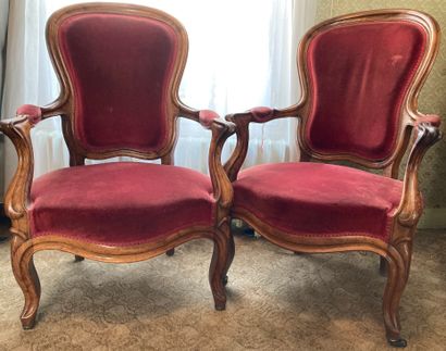 Pair of rosewood armchairs, the back violoné,...