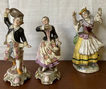Pair of polychrome porcelain statuettes,...