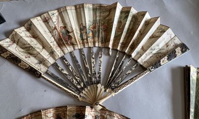 Four fans, the mounts in ivory or bone with...
