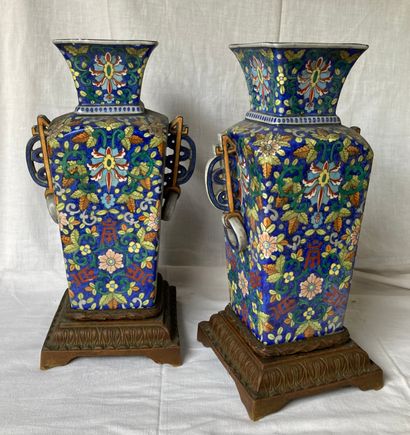Pair of square porcelain vases decorated...