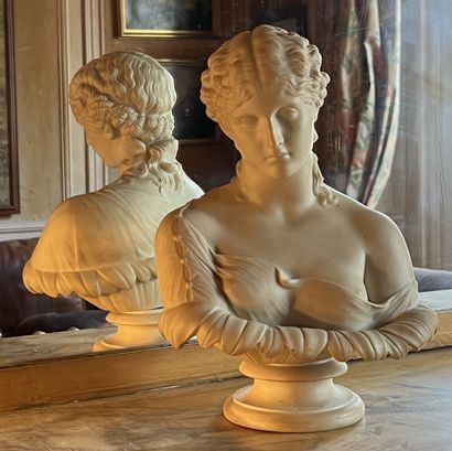 Bisque bust of a young woman, a bare breast...