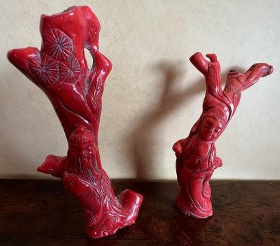Two coral branches carved with characters....