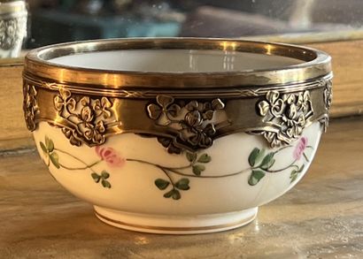 Small porcelain bowl decorated with a flowery...