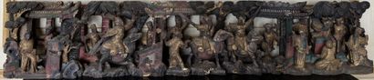 Wooden frieze carved in high relief and painted...