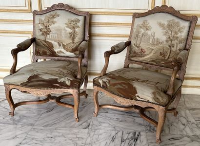 Pair of armchairs in natural wood molded...