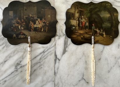 Pair of hand screens, the leaf of contoured...