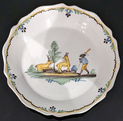 Large dish in enamelled earthenware, with...