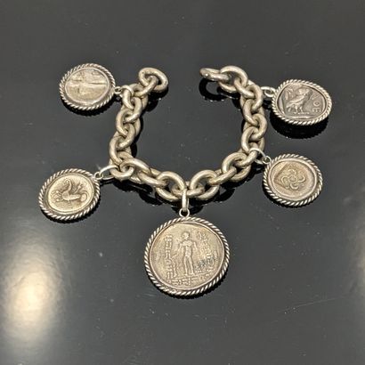 Curb in silver (925), the oval links holding...