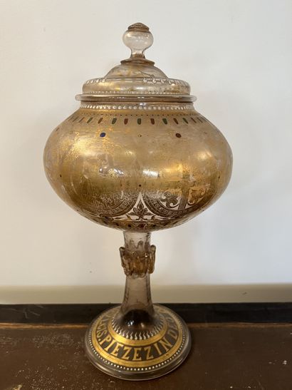 Large covered glass cup with enamelled decoration...