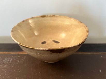 Bowl in beige enamelled stoneware cracked....