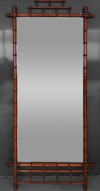 Large mirror with bamboo frame, the upper...