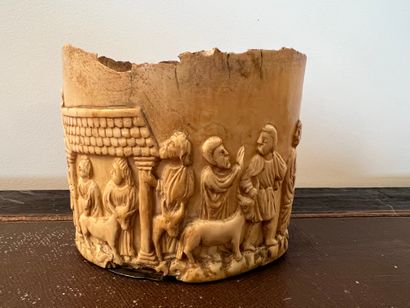Oval bone base with carved decoration in...