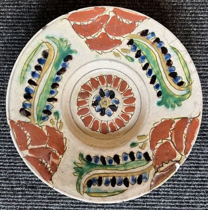 Small siliceous ceramic cup on heel decorated...