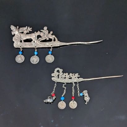 Two South American silver topos (800), one...