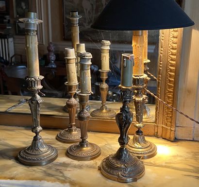 Two pairs of torches and a cast bronze torch...