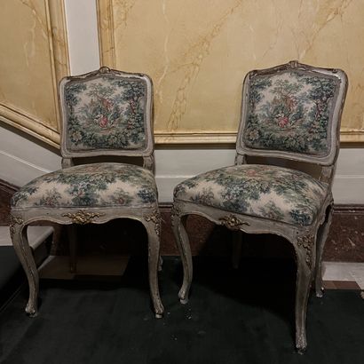 Pair of chairs in cream lacquered wood rechampi...