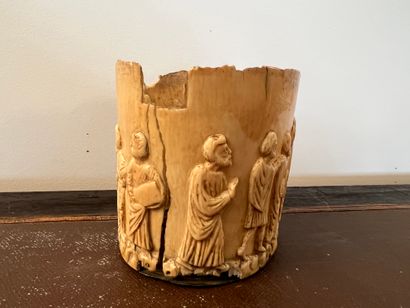 Oval bone base with carved decoration in...