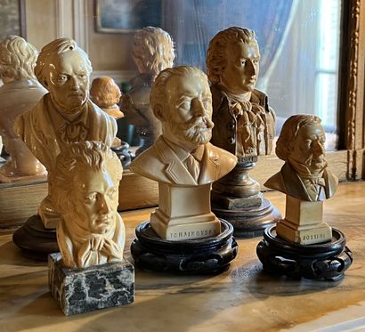 Five small busts of composers in composition...