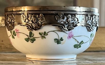 Small porcelain bowl decorated with a flowery...