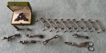 Suite of six silver plated knife holders...