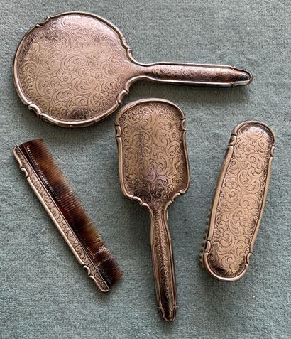 Part of a silver toilet set (800), chased...