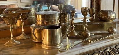 Gilt brass manette: pair of small torches;...