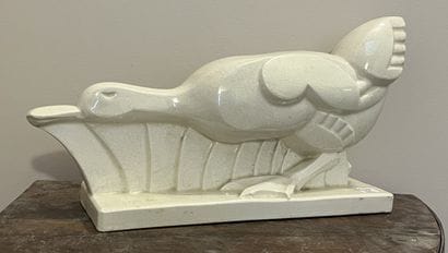 Duck in beige glazed earthenware. H. 21 cm...