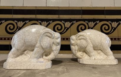 Pair of bookends in beige enamelled earthenware...