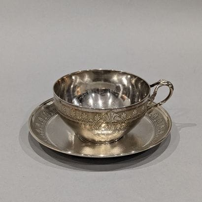 Cup and its saucer in silver (950), with...