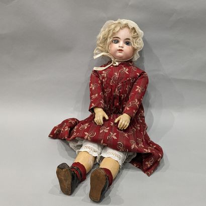 Doll, head in porcelain marked in hollow...