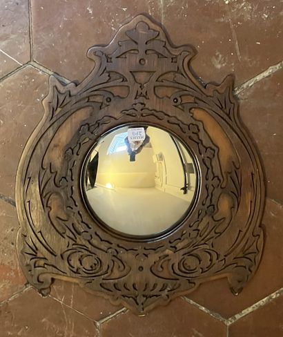Witch mirror, the frame in the shape of a...