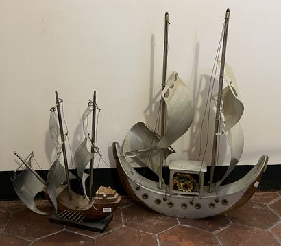 Five large sculptures of sailing ships, the...