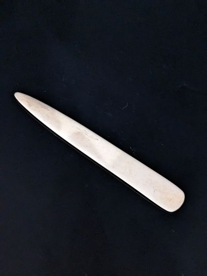 Small set of objects in marine ivory: handle...