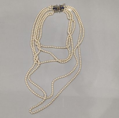Necklace with rows of pearls. The clasp in...