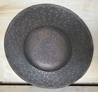 Hollow dish in patinated brass, the umbilicus...