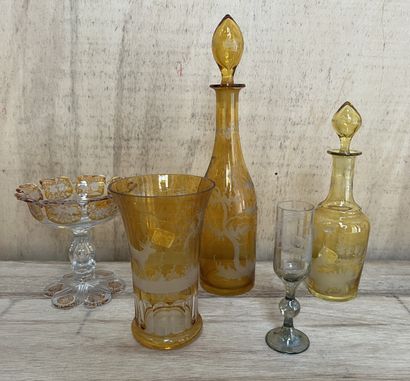 Set in crystal or yellow lined glass of Bohemia,...