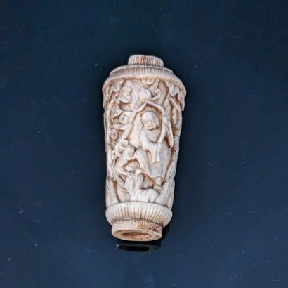 Bone handle carved with characters among...