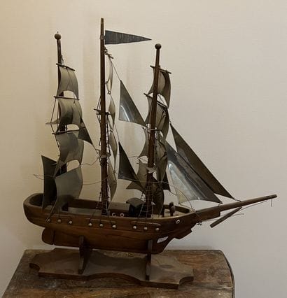 Five large sculptures of sailing ships, the...