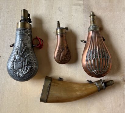 Set of four powder flasks, two in copper...